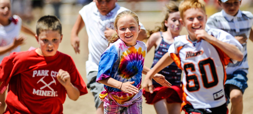 Children playing a group activity game together in a learning environment