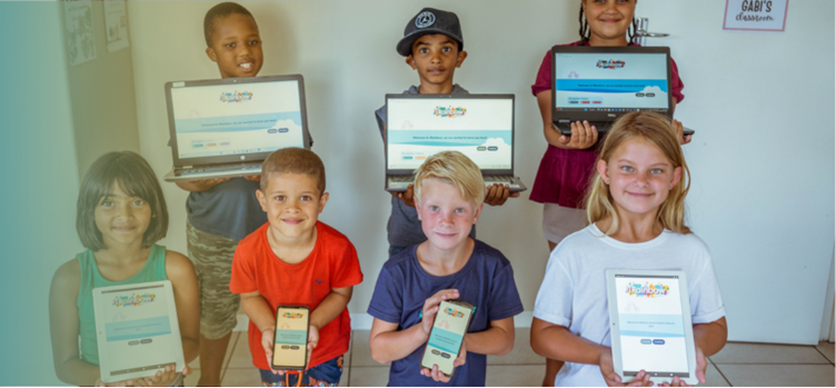 Children using iRainbow educational software on a computer