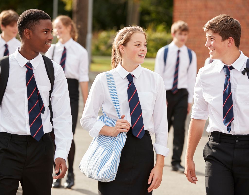 Matric learners leaving an exam venue after writing a paper