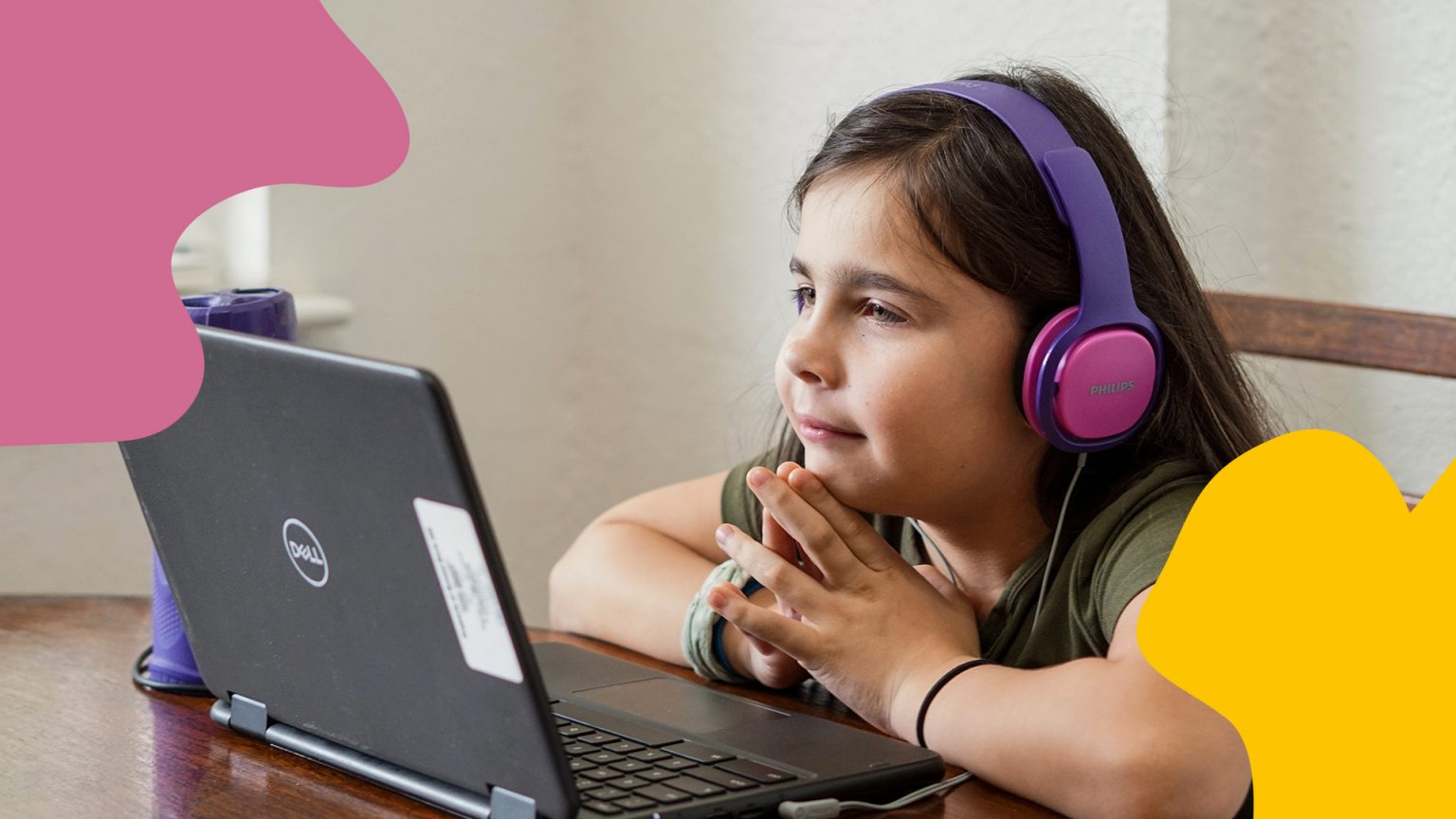 A learner enjoying online learning on a laptop at home