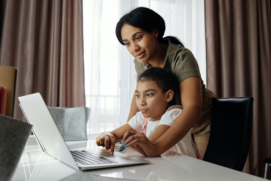 A parent and child sharing a moment that builds confidence and self-esteem