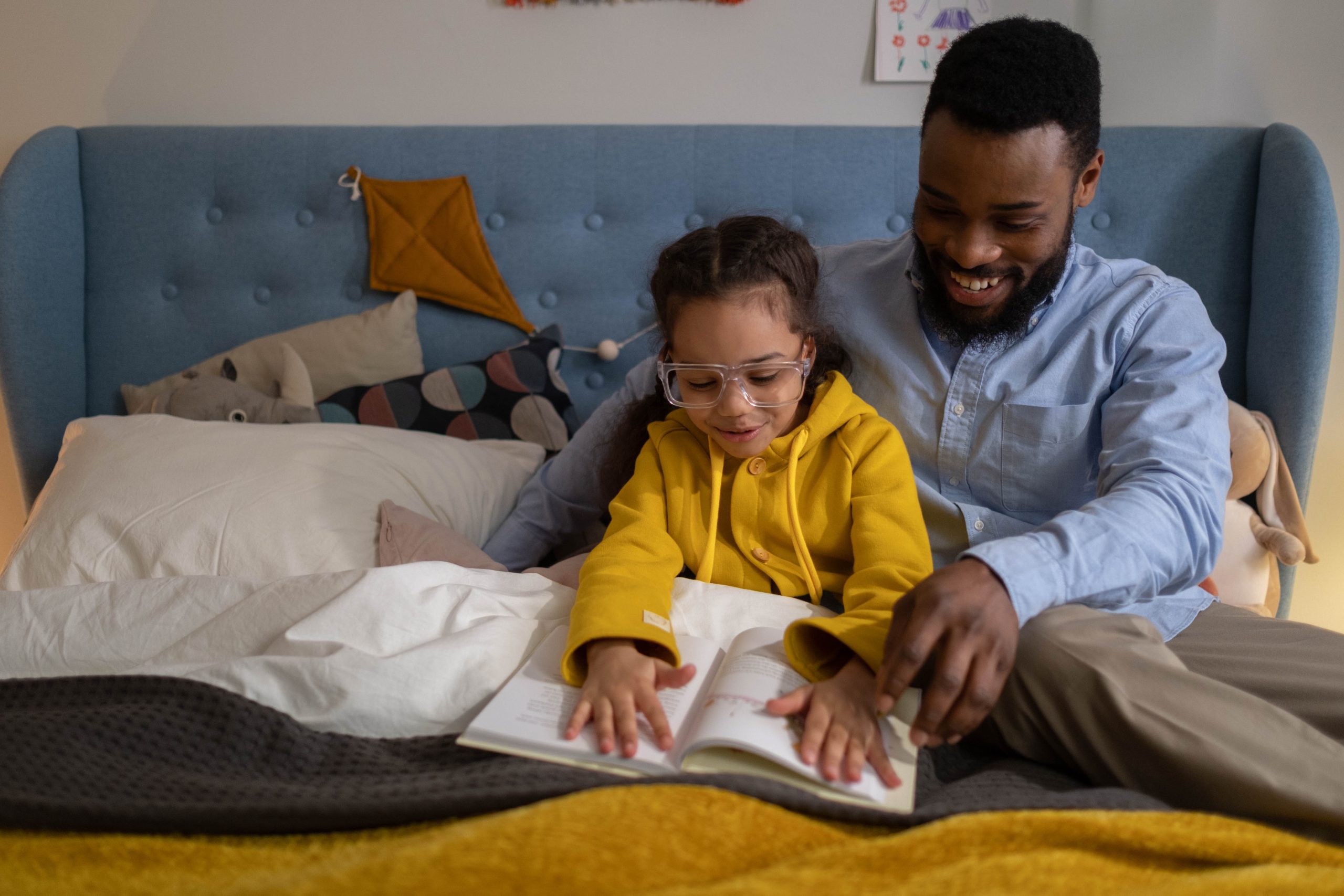 A parent reading with their child, handling parenting with confidence